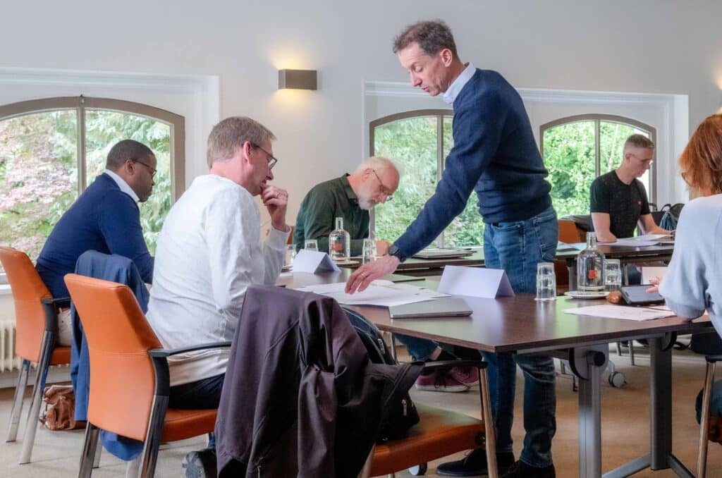 Hoofddocent Wouter van Aerle van Deltiq tijdens de door Deltiq georganiseerde CDO Masterclass 2025